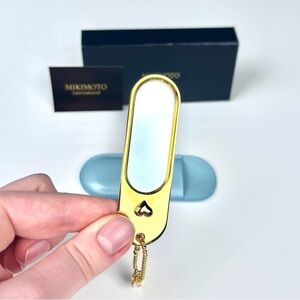 Authentic MIKIMOTO International gold tone metal small mirror with real pearl